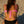 Load image into Gallery viewer, Woman on beach wearing a Bambina Swim mix and match two piece bikini, bright pink top, black bottom
