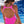 Load image into Gallery viewer, Woman sitting poolside wearing a Bambina Swim bright pink one piece swimsuit
