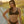 Load image into Gallery viewer, Woman on beach at sunset wearing a black two-piece bikini