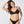 Load image into Gallery viewer, Woman wearing a Bambina Swim black two piece bikini, ring detail on strap, tie back, mid coverage bottom, high cut leg.
