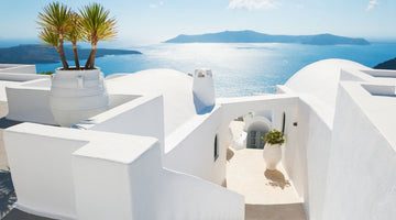 White houses overlooking ocean in Santorini Greece