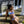 Woman wearing a Bambina Swim two piece aqua bikini with and navy and white chevron stipe detail, double adjustable straps
