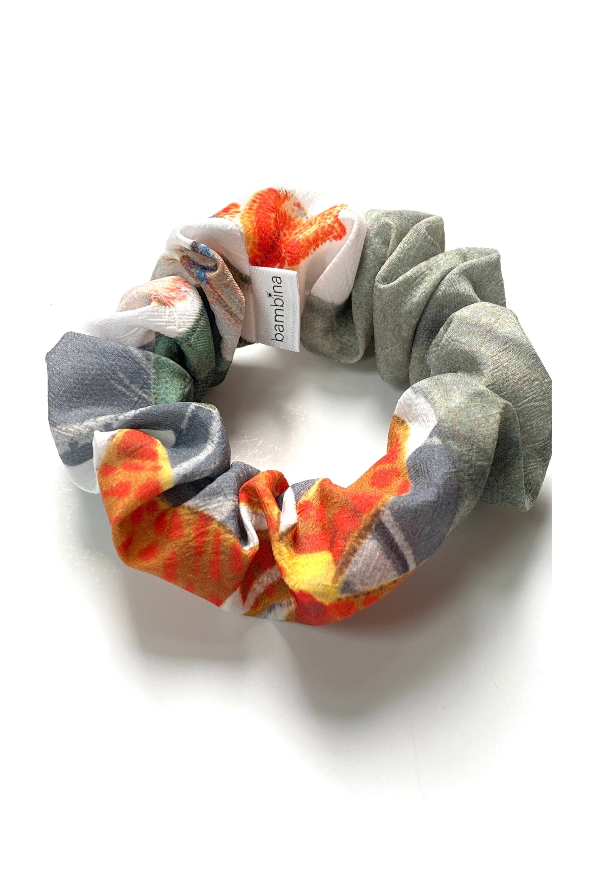 Cardamom Scrunchie flat lay showing print and gathered round shape of fabric.