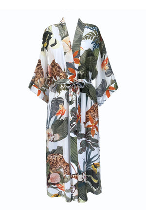 Bambina Swim Cardamom robe in tropical print, front ghost image showing wrap design and waist tie detail.