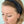 Load image into Gallery viewer, Woman wearing black headband with knot on top.
