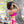 Load image into Gallery viewer, Woman in thong bikini bottom, raspberry color, side view
